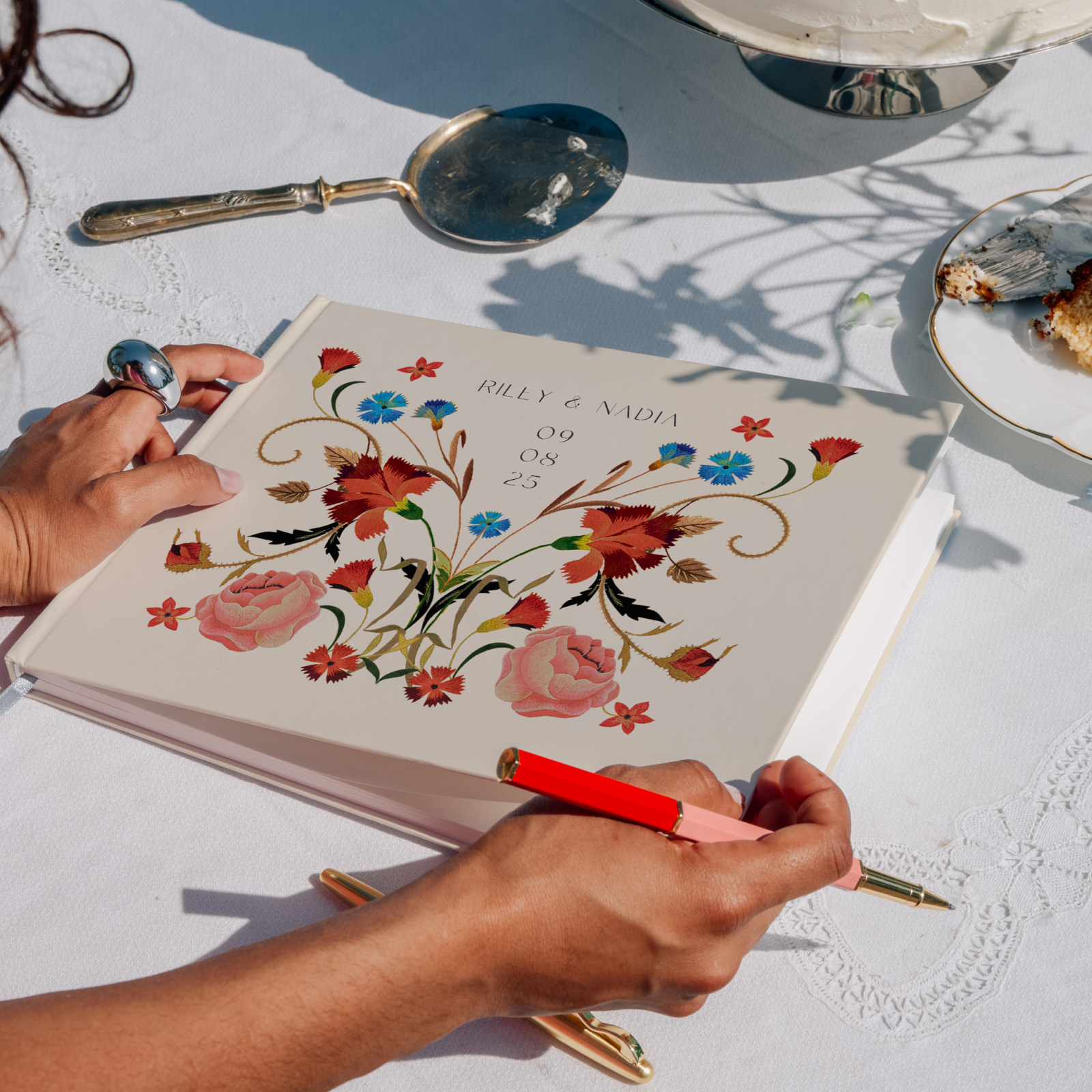 0524_site_weddingOTD_Hub_Hero_guestbook.jpg